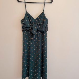 Dark green midi dress with polka dots